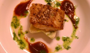 Seared Cod on Colcannon Cake, Stout Reduction and Cress Puree