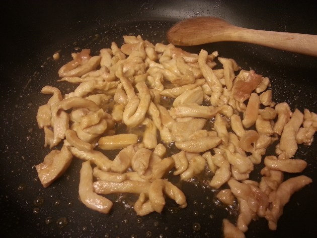 Cook chicken until done and golden